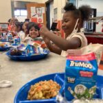 Colorado among 8 states where students can now eat free school meals, advocates urge Congress for nationwide policy