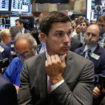 Nasdaq slips, Dow rises as Wall Street weighs inflation data: Stock market news today