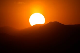 Sunny and warm with chance of afternoon thunderstorms