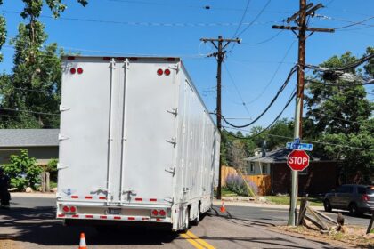 Truck hits utility pole in Arvada, taking out power, traffic lights