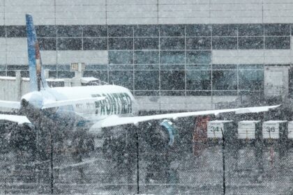 Delays and cancellations continue at DIA, nearly 400 by 11 a.m.