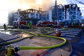 Aurora construction fire at East Colfax, Peoria fully doused Thursday