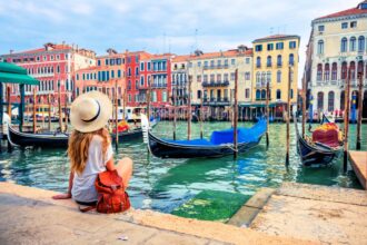 Young female tourist enjoyment Venice city- travel, tour tourism in Europe