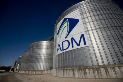 ADM Places CFO on Leave, Cuts Earnings Forecast Amid Probe