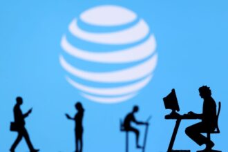 AT&T's 2024 profit outlook misses estimates amid race with cable