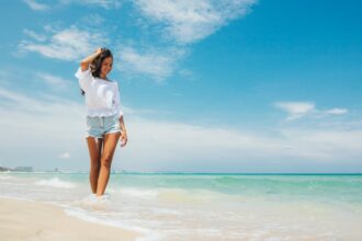 Woman Walking on the Beach