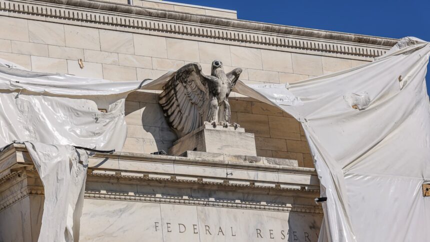 Watchdog critical of former Fed officials in stock trading controversy