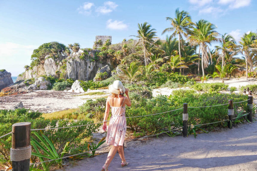 Young Woman Exploring The Ruins Of Tulum, Mexico