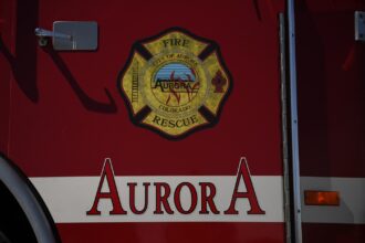 Car drives through Aurora home, causes gas leak