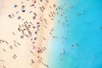 Aerial view of tourists on a beach in Greece