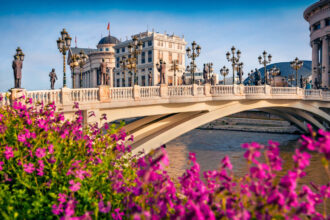 Flowers Blooming Near A Bridge In Skopje, North Macedonia, Balkan Peninsula, South Eastern Europe