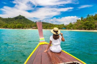 A female traveler taking a boat ride with views of punta cana