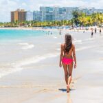 Woman walking on beach in Puerto Rico