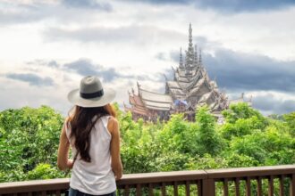 Female tourist looking at a temple