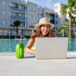 A digital nomad in the pool in Spain