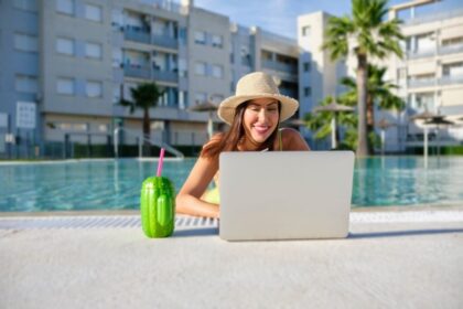 A digital nomad in the pool in Spain