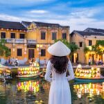 Young Woman Taking A Picture In Hoi An, Vietnam, Southeast Asia