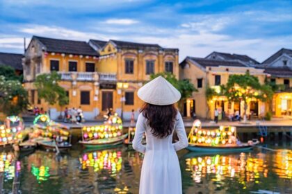 Young Woman Taking A Picture In Hoi An, Vietnam, Southeast Asia