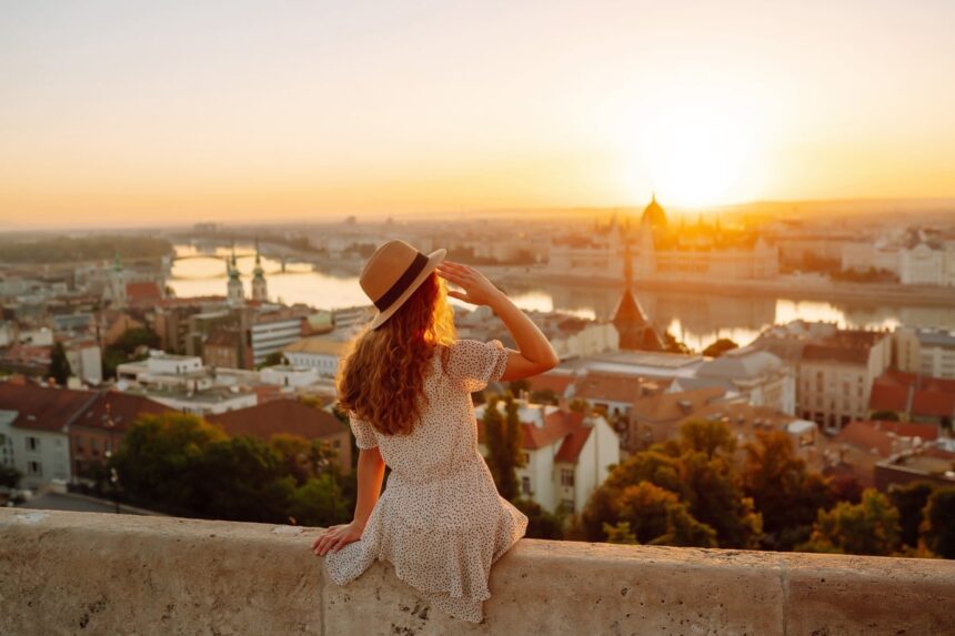 Young Female Tourist Admiring A View Of Budapest, Hungary