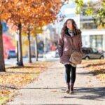 Woman walking in Washington DC in the fall