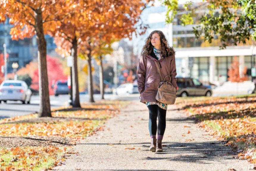 Woman walking in Washington DC in the fall