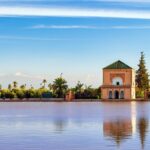 Saadian Pavillon at Menara gardens with Atlas mountains in Marrakech, Morocco