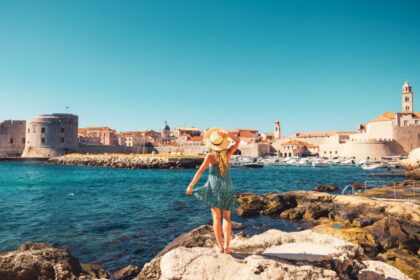 Woman enjoying a stunning view of Dubrovnik