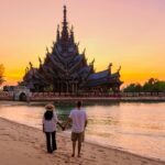 Couple visit the Sanctuary of Truth, Pattaya