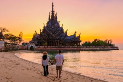 Couple visit the Sanctuary of Truth, Pattaya