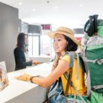 Tourist checking into hotel in Zaragoza, Spain