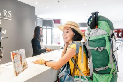 Tourist checking into hotel in Zaragoza, Spain