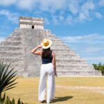 Woman visiting Chichen Itza on nice day