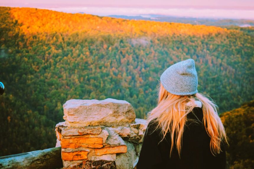 Woman looking out from Coopers Rock Overlook, West Virginia, USA