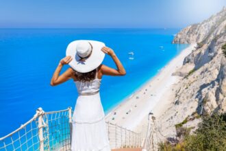 Woman overlooking Egremni Beach, Lefkada