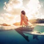 Woman surfing on a beach in Costa Rica