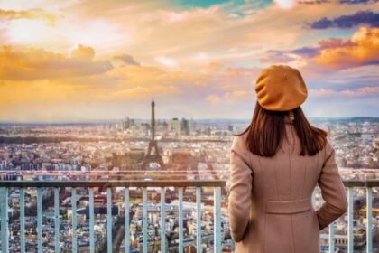 Woman overlooking Paris and the Eiffel Tower