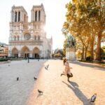 Woman in front of Notre Dame in Paris