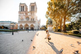 Woman in front of Notre Dame in Paris