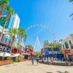 People enjoying Las Vegas attractions on sunny day