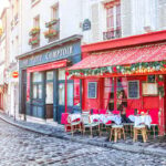 Cobbled cafe-lined street in Paris in winter