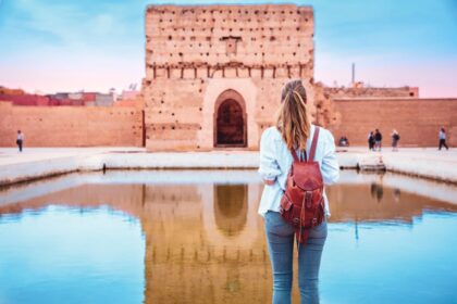 Woman visiting Badi Palace in Marrakesh