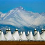 1 taken to hospital after DIA American Airlines flight evacuated