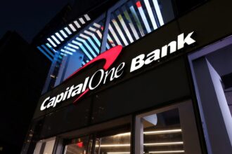 Capital One (COF) climbs as investors buy into the Discover vision