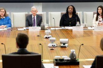 Divided Fed OKs rule to ease capital requirements for big Wall Street banks