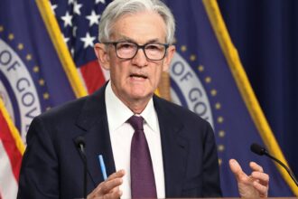 Fed leaves rates unchanged, defying Trump's demands for aggressive cuts