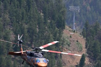 Mighty Argo Cable Car gondola towers installed above Idaho Springs