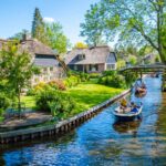 Charming Canal In Giethoorn, The Netherlands