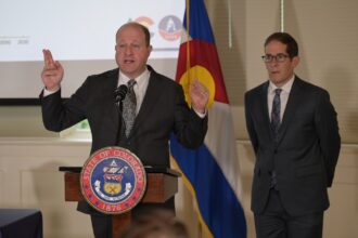 Colorado Gov. Jared Polis orders spending cuts for budget shortfall