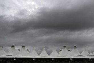 DIA ground stop for severe thunderstorms delays flights
