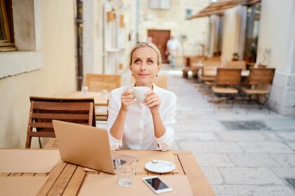 Digital nomad sipping coffee at Croatia cafe
